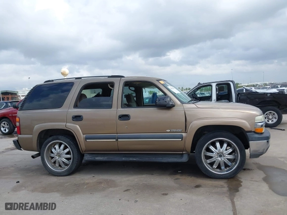 2003 Chevrolet Tahoe LS with VIN 1GNEC13V33J338251, listed as a IAAI auction lot 41634451 with 265,779 mi miles. Bid and sale history available at carsss.com. Image 14.