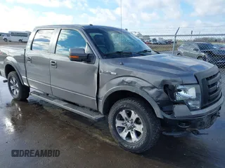 2012 Ford F-150 XL with VIN 1FTFW1EF3CKE07217, listed as a IAAI auction lot 41115790 with 214,119 mi miles. Bid and sale history available at carsss.com. Image 1.