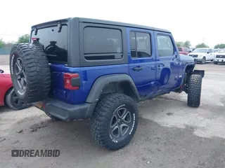 2019 Jeep Wrangler Unlimited Sport Altitude with VIN 1C4HJXDG6KW578572, listed as a IAAI auction lot 41921919 with 30,247 mi miles and . Bid and sale history available at DreamBid. Image 4.