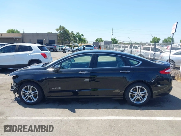 2016 Ford Fusion Titanium Hybrid z VIN 3FA6P0RUXGR123445, wystawiony jako IAAI lot #42606596 z przebiegiem 145 541 mil mil oraz . Historia ofert i sprzedaży dostępna na DreamBid. Obrazek 15.