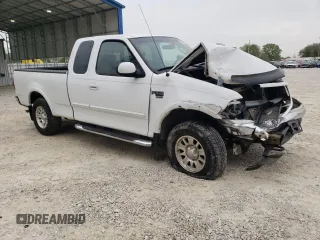 2002 Ford F-150 XL with VIN 1FTRX18L42NB60380, listed as a Copart auction lot 51806955 with 293,591 mi miles and Salvage title. Bid and sale history available at DreamBid. Image 4.