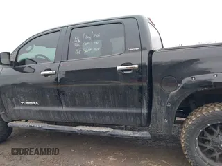 2012 Toyota Tundra 4WD Truck LTD with VIN 5TFHW5F19CX218772, listed as a IAAI auction lot 41472955 with 134,928 mi miles. Bid and sale history available at carsss.com. Image 14.