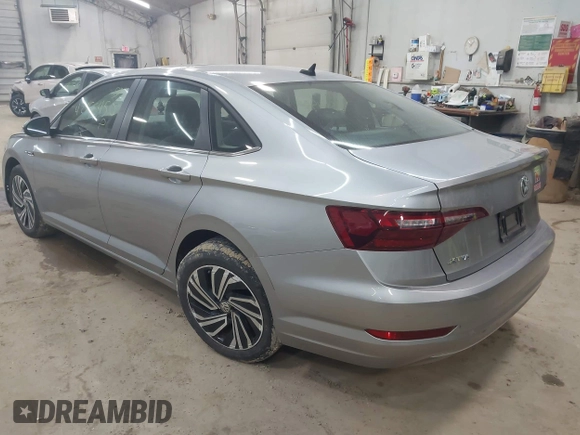 2021 Volkswagen Jetta SEL with VIN 3VWE57BUXMM056379, listed as a IAAI auction lot 42456450 with 34,697 mi miles and . Bid and sale history available at DreamBid. Image 3.