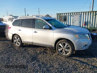 2014 Nissan Pathfinder Platinum with VIN 5N1AR2MM9EC676855, listed as a IAAI auction lot 41450200 with 142,322 mi miles and . Bid and sale history available at DreamBid. Image 1.