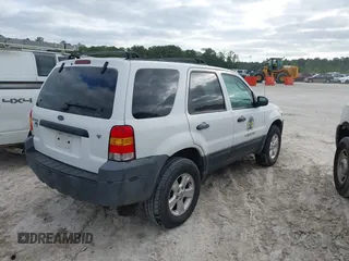2006 Ford Escape XLT with VIN 1FMYU93196KC72975, listed as a IAAI auction lot 42088686 with 75,440 mi miles and . Bid and sale history available at DreamBid. Image 4.