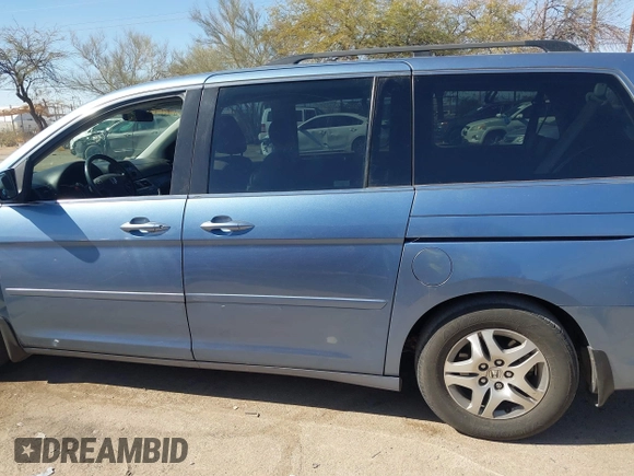2006 Honda Odyssey EX-L with VIN 5FNRL38796B099851, listed as a IAAI auction lot 41555109 with 154,707 mi miles and . Bid and sale history available at DreamBid. Image 15.