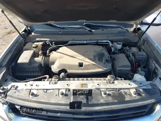 2018 Chevrolet Colorado 2WD LT z VIN 1GCGSCEN5J1300840, wystawiony jako IAAI lot #41997279 z przebiegiem 75 705 mil mil oraz . Historia ofert i sprzedaży dostępna na DreamBid. Obrazek 10.