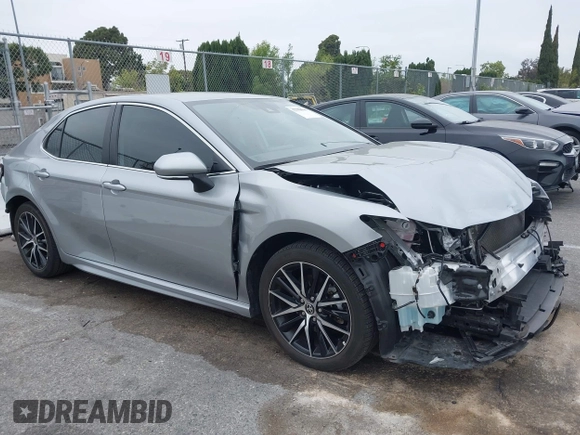 2023 Toyota Camry SE with VIN 4T1G11AKXPU809876, listed as a IAAI auction lot 42100546 with 35,055 mi miles and . Bid and sale history available at DreamBid. Image 1.
