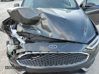 2019 Ford Fusion Hybrid Titanium with VIN 3FA6P0RU3KR138040, listed as a Copart auction lot 70843932 with 68,133 mi miles. Bid and sale history available at carsss.com. Image 12.
