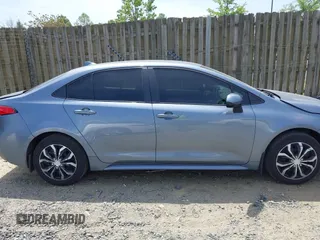 2021 Toyota Corolla LE with VIN JTDEPMAE2MJ148539, listed as a IAAI auction lot 42137624 with 67,983 mi miles and . Bid and sale history available at DreamBid. Image 13.