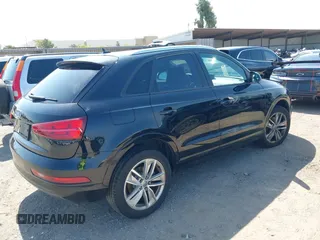 2017 Audi Q3 Premium with VIN WA1BCCFS5HR010731, listed as a IAAI auction lot 42211073 with 67,383 mi miles and . Bid and sale history available at DreamBid. Image 4.