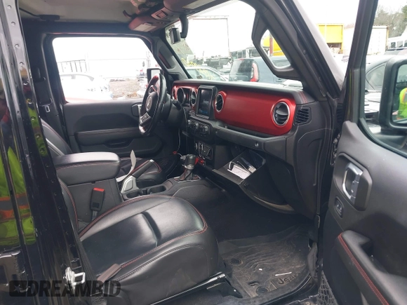 2021 Jeep Gladiator Rubicon z VIN 1C6JJTBG8ML524215, wystawiony jako IAAI lot #41829990 z przebiegiem 62 942 mil mil oraz . Historia ofert i sprzedaży dostępna na DreamBid. Obrazek 5.