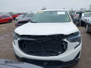 2021 GMC Terrain SLE with VIN 3GKALMEV9ML381769, listed as a IAAI auction lot 42011987 with 82,695 mi miles and . Bid and sale history available at carsss.com. Image 13.