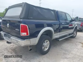 2013 Ram 2500 Laramie with VIN 3C6UR5FL1DG526345, listed as a IAAI auction lot 42328430 with 121,155 mi miles and . Bid and sale history available at DreamBid. Image 4.