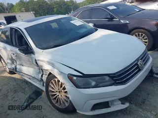 2016 Volkswagen Passat SE with VIN 1VWBT7A32GC011587, listed as a IAAI auction lot 42404625 with 146,784 mi miles and . Bid and sale history available at DreamBid. Image 1.