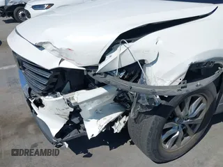2019 Mazda CX-9 Touring with VIN JM3TCACY5K0306424, listed as a IAAI auction lot 42150466 with 95,166 mi miles and . Bid and sale history available at DreamBid. Image 6.