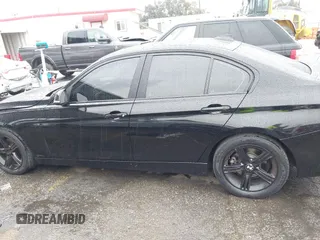 2015 BMW 3 Series 328i with VIN WBA3A5C59FF606236, listed as a IAAI auction lot 41690502 with 115,085 mi miles. Bid and sale history available at carsss.com. Image 14.