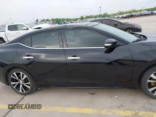2017 Nissan Maxima SV z VIN 1N4AA6AP0HC450683, wystawiony jako IAAI lot #42101171 z przebiegiem 105 894 mil mil oraz . Historia ofert i sprzedaży dostępna na DreamBid. Obrazek 13.