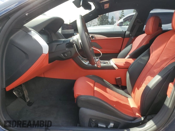 2025 BMW 8 Series M850i with VIN WBAGV8C07SCT18237, listed as a Copart auction lot 49277375 with 750 mi miles and Salvage title. Bid and sale history available at DreamBid. Image 7.