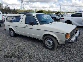 1983 Volkswagen Rabbit z VIN 1V1KG0170DV038002, wystawiony jako Copart lot #79815264 z przebiegiem 147 480 mil mil oraz Szkody całkowita. Historia ofert i sprzedaży dostępna na DreamBid. Obrazek 4.