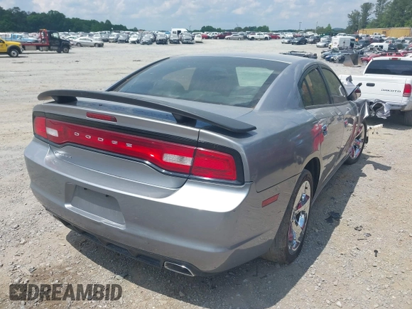 2013 Dodge Charger SE z VIN 2C3CDXBG1DH609530, wystawiony jako IAAI lot #42151140 z przebiegiem 173 210 mil mil oraz . Historia ofert i sprzedaży dostępna na DreamBid. Obrazek 4.