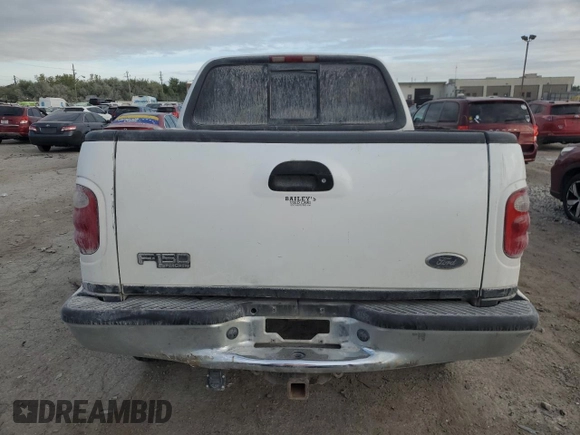 2001 Ford F-150 SuperCrew XLT with VIN 1FTRW08L81KE40946, listed as a Copart auction lot 70482874 with 0 mi miles and Salvage Title. Bid and sale history available at carsss.com. Image 6.