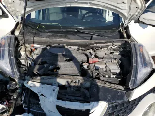 2016 Nissan Juke SL z VIN JN8AF5MV3GT659404, wystawiony jako Copart lot #71848094 z przebiegiem 176 915 mil mil oraz Szkoda całkowita • Salvage title. Historia ofert i sprzedaży dostępna na DreamBid. Obrazek 11.