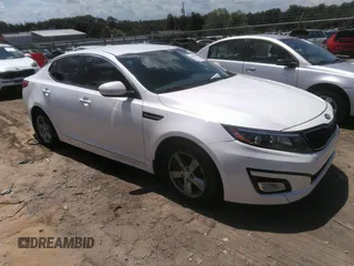 2015 Kia Optima LX with VIN KNAGM4A70F5645049, listed as a IAAI auction lot 42758383 with 214,934 mi miles and . Bid and sale history available at DreamBid. Image 1.