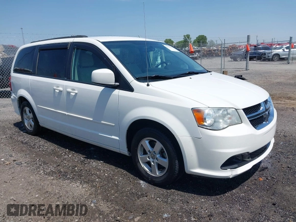 2012 Dodge Grand Caravan SXT with VIN 2C4RDGCG9CR200432, listed as a IAAI auction lot 42027477 with 99,076 mi miles and . Bid and sale history available at DreamBid. Image 1.