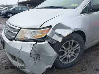 2013 Honda Odyssey EX-L with VIN 5FNRL5H63DB007682, listed as a IAAI auction lot 41408103 with 201,453 mi miles and . Bid and sale history available at carsss.com. Image 6.