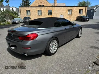 2012 BMW 6 Series 650i z VIN WBALZ3C55CDL70608, wystawiony jako Copart lot #59791605 z przebiegiem 97 077 mil mil oraz Czysty tytuł • Clean title. Historia ofert i sprzedaży dostępna na DreamBid. Obrazek 4.