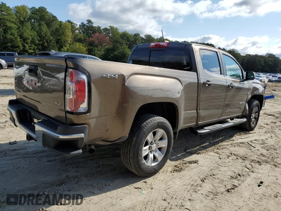2016 GMC Canyon 4WD SLE with VIN 1GTG6CE38G1293670, listed as a Copart auction lot 72114774 with 125,659 mi miles and Salvage Title. Bid and sale history available at carsss.com. Image 3.