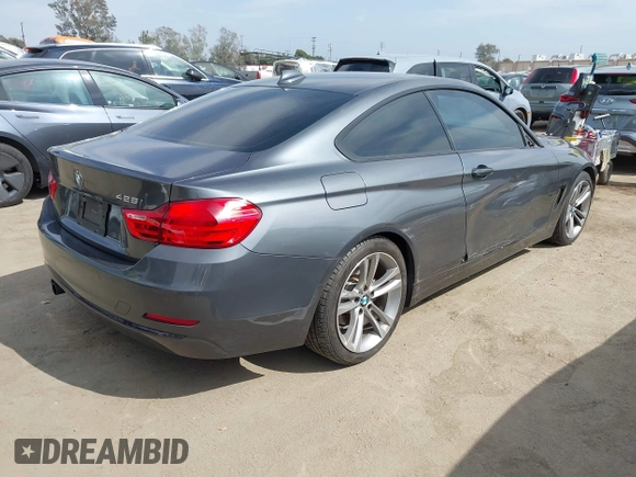 2014 BMW 4 Series 428i with VIN WBA3N7C5XEF718428, listed as a IAAI auction lot 42043910 with 157,686 mi miles and . Bid and sale history available at DreamBid. Image 4.