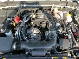 2023 Jeep Wrangler Sport z VIN 1C4HJXAG2PW650279, wystawiony jako Copart lot #80876745 z przebiegiem 10 349 mil mil oraz Szkoda całkowita • Salvage title. Historia ofert i sprzedaży dostępna na DreamBid. Obrazek 13.