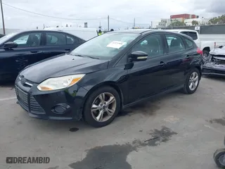 2014 Ford Focus SE with VIN 1FADP3K27EL199542, listed as a IAAI auction lot 42071908 with 142,180 mi miles. Bid and sale history available at carsss.com. Image 2.