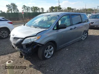 2015 Toyota Sienna L with VIN 5TDZK3DCXFS596277, listed as a IAAI auction lot 41229427 with 108,900 mi miles and . Bid and sale history available at DreamBid. Image 2.
