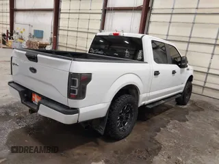 2016 Ford F-150 XLT with VIN 1FTEW1EP3GKE25825, listed as a IAAI auction lot 41254806 with 140,971 mi miles. Bid and sale history available at carsss.com. Image 4.