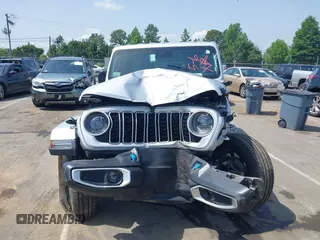 2024 Jeep Wrangler Sahara with VIN 1C4RJXP60RW292136, listed as a IAAI auction lot 42280063 with 26,701 mi miles and . Bid and sale history available at DreamBid. Image 12.