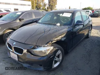 2015 BMW 3 Series 328i xDrive with VIN WBA3B3C57FF547110, listed as a IAAI auction lot 41870141 with 49,412 mi miles and . Bid and sale history available at carsss.com. Image 18.
