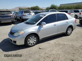 2011 Nissan Versa S with VIN 3N1BC1AP0BL410081, listed as a Copart auction lot 73737064 with 201,142 mi miles and Salvage title. Bid and sale history available at DreamBid. Image 1.