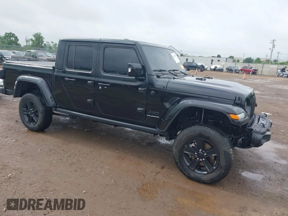 2023 Jeep Gladiator Overland with VIN 1C6JJTFM9PL593659, listed as a IAAI auction lot 42470253 with 34,374 mi miles and . Bid and sale history available at DreamBid. Image 1.