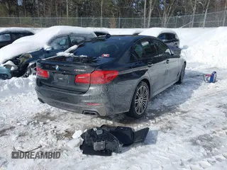 2020 BMW 5 Series M550i xDrive with VIN WBAJS7C00LCD91804, listed as a IAAI auction lot 41590368 with Not provided miles and . Bid and sale history available at DreamBid. Image 4.