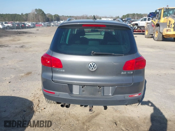 2012 Volkswagen Tiguan SE with VIN WVGAV7AX5CW000275, listed as a IAAI auction lot 41789246 with 123,618 mi miles and . Bid and sale history available at DreamBid. Image 16.