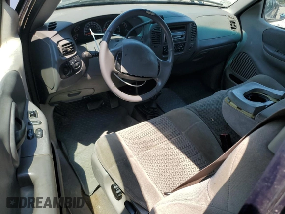 2002 Ford F-150 XL with VIN 1FTRX18L82NB06824, listed as a Copart auction lot 57342315 with 207,390 mi miles and Salvage title. Bid and sale history available at DreamBid. Image 8.