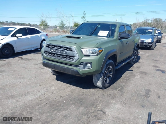 2016 Toyota Tacoma SR with VIN 3TMCZ5ANXGM038420, listed as a IAAI auction lot 41635372 with 113,723 mi miles. Bid and sale history available at carsss.com. Image 17.