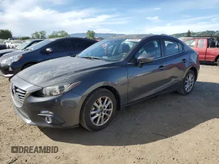 2014 Mazda 3 i Touring with VIN JM1BM1V74E1110673, listed as a Copart auction lot 52985505 with 86,032 mi miles and Salvage Title. Bid and sale history available at DreamBid. Image 1.