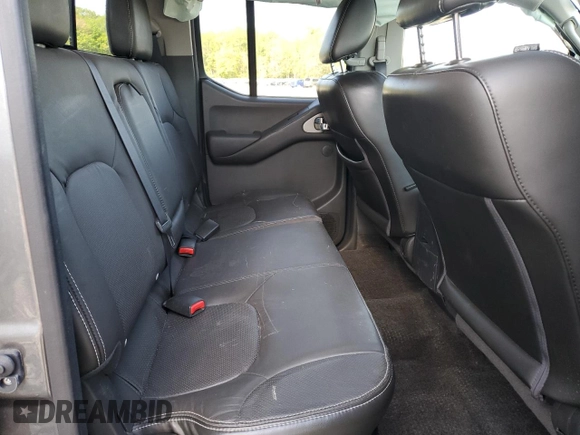 2016 Nissan Frontier Pro-4X with VIN 1N6AD0EVXGN702673, listed as a Copart auction lot 54716865 with 81,258 mi miles and Salvage title. Bid and sale history available at DreamBid. Image 10.