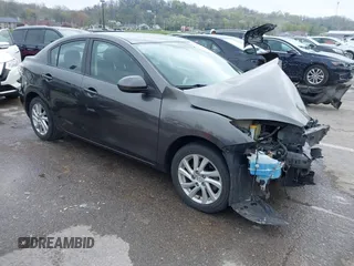 2012 Mazda 3 i Touring with VIN JM1BL1V78C1596808, listed as a IAAI auction lot 42004109 with Not Provided miles and . Bid and sale history available at DreamBid. Image 1.