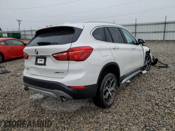 2019 BMW X1 sDrive28i with VIN WBXHU7C53K5L12037, listed as a Copart auction lot 65538082 with Not Provided miles and . Bid and sale history available at DreamBid. Image 4.
