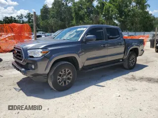 2020 Toyota Tacoma SR5 with VIN 3TMAZ5CN5LM118349, listed as a Copart auction lot 61004965 with 64,041 mi miles and Salvage title. Bid and sale history available at DreamBid. Image 1.